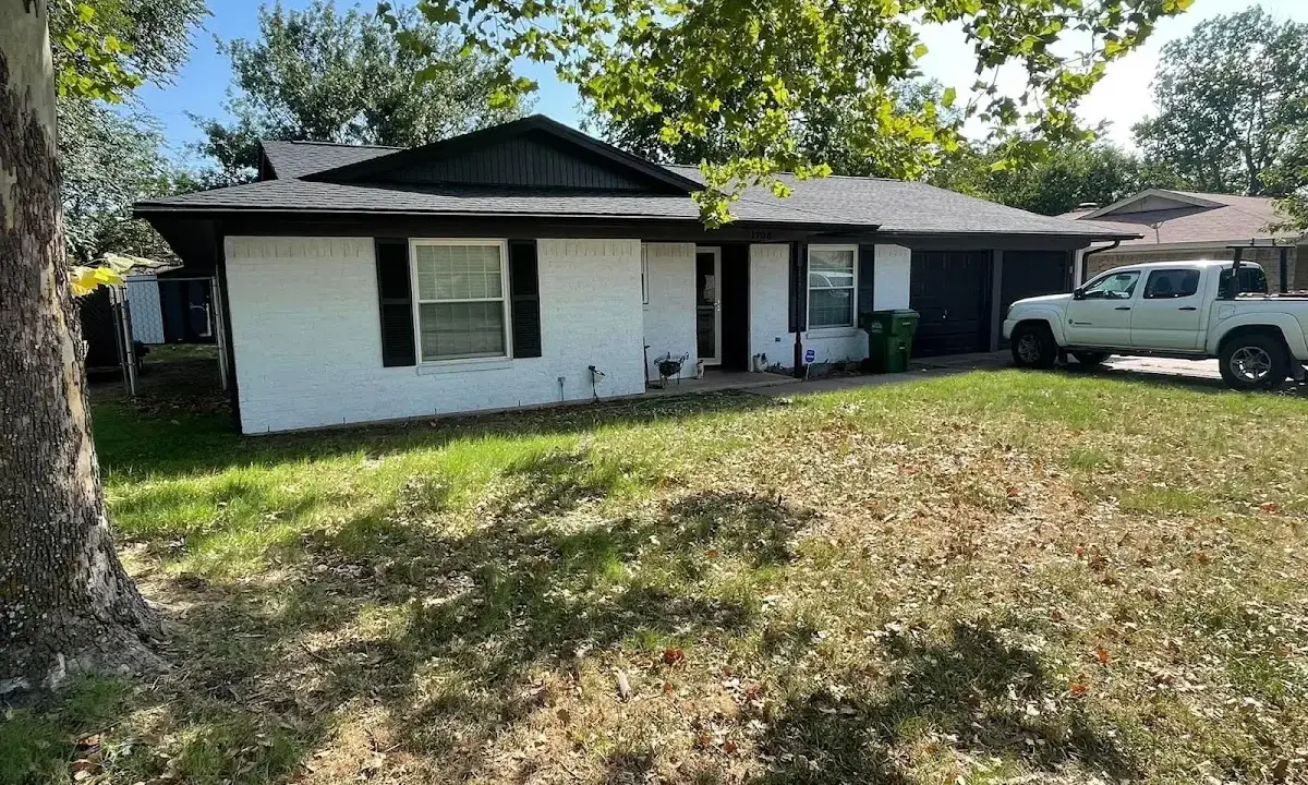 Professional roofing crew working on a residential roof in Lehighton